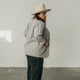 back and side view of woman wearing the denim artist jacket